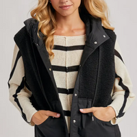 Women in a cozy and warm Sherpa winter vest