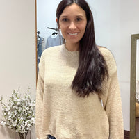 Beige colored light weight knit top