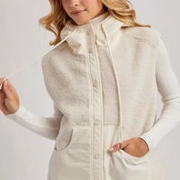 Women wearing a cute and stylish winter Sherpa Vest.