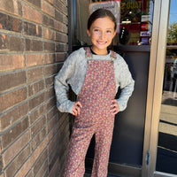 Tween girls bib overalls in floral print with light green sweater