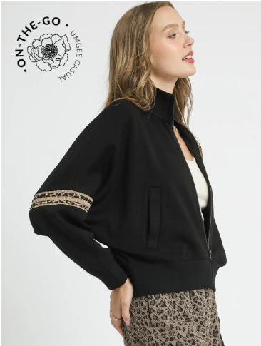 Women's full zip sweatshirt with leopard detail on one sleeve