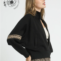 Women's full zip sweatshirt with leopard detail on one sleeve