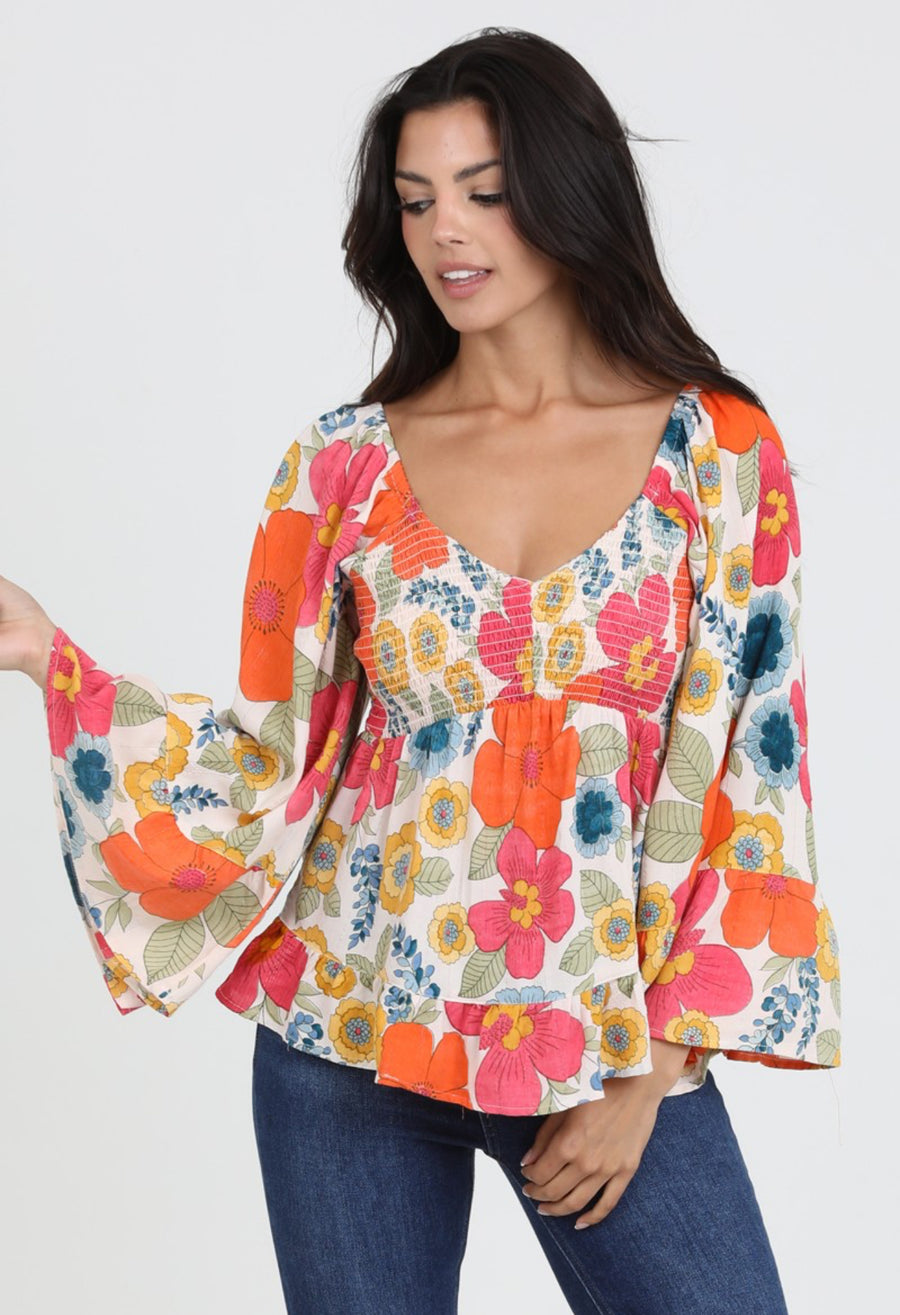 The Clara V Neck Bell Sleeve Floral Blouse