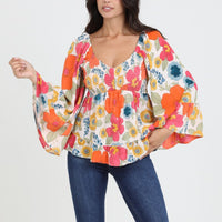 The Clara V Neck Bell Sleeve Floral Blouse