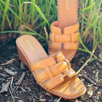 The Mingle Tan Wedge Sandal