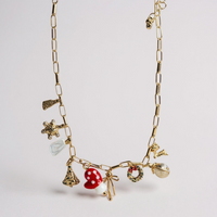 Christmas mitten charm necklace in gold 