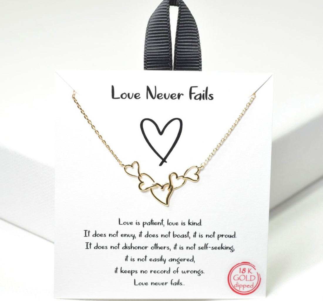 Love Never Fails Gold Heart Necklaces