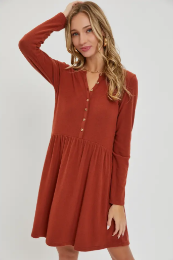 Women's rust colored dress with detailed buttons