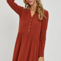 Women's rust colored dress with detailed buttons