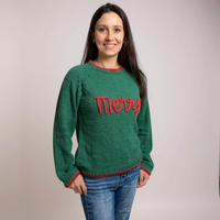 Green soft sweater with red Merry lettering 
