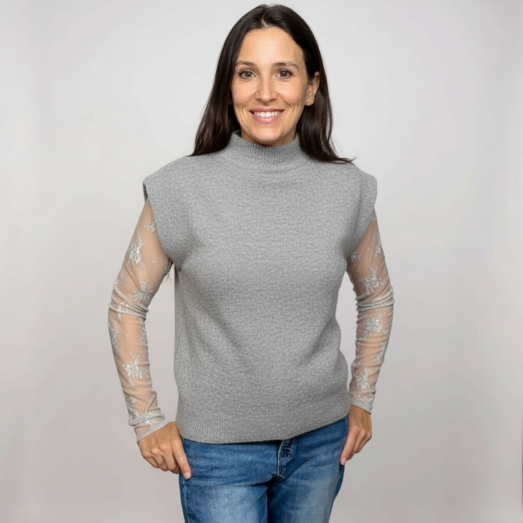 Grey sweater vest with mock neck. good for layering with lace top