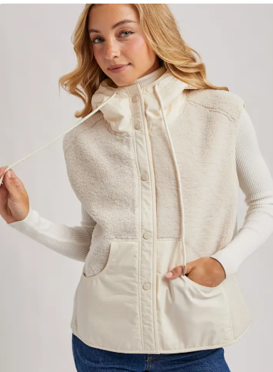 Women wearing a cute and stylish winter Sherpa Vest. 