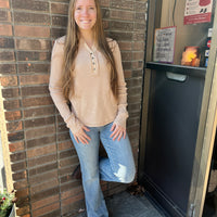 Thermal half button long sleeve in a tan color 