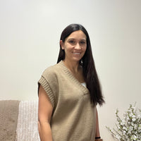 V neck sleeveless sweater in a brown/tan color 